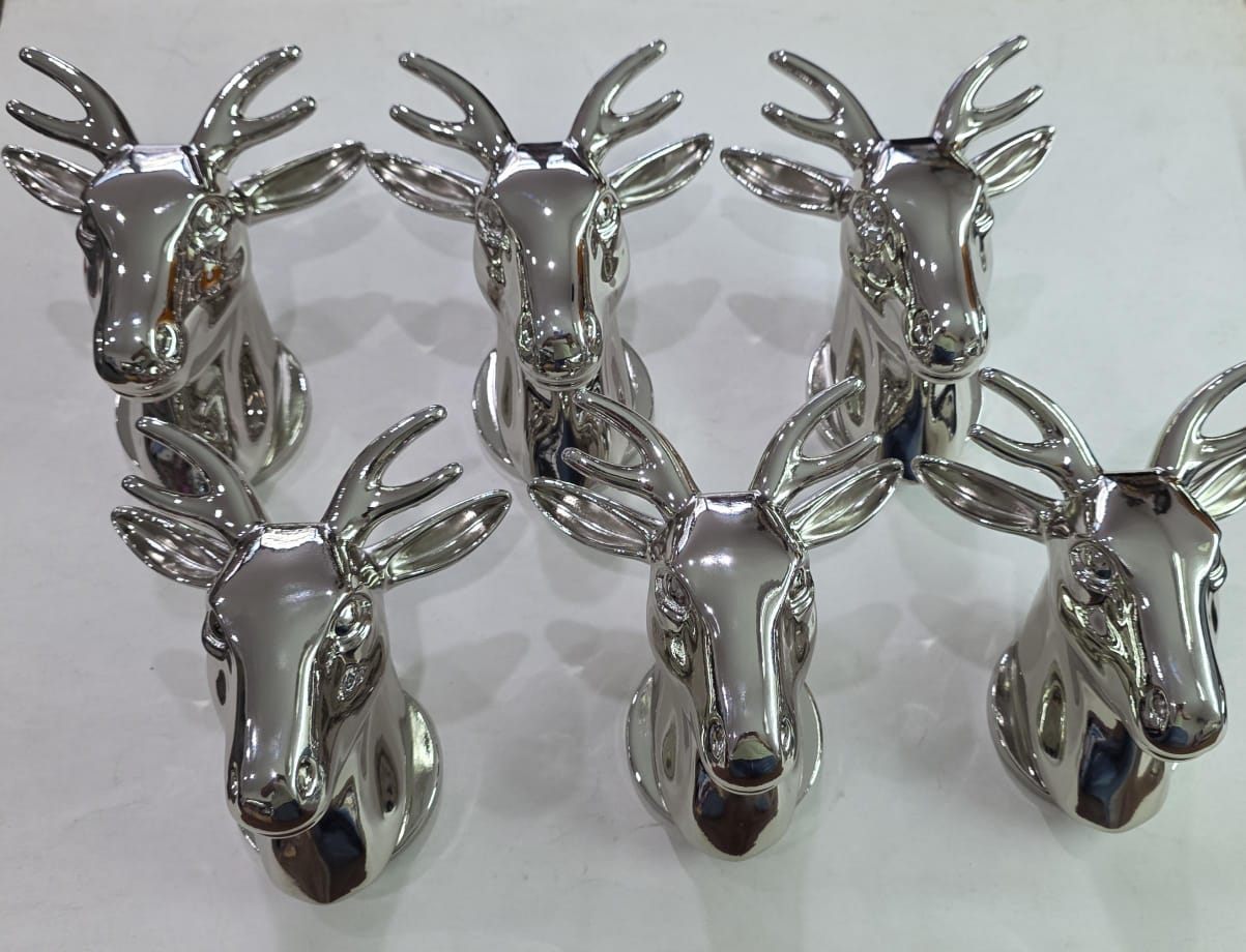 Six identical mirror-chrome finished deer head sculptures by 3D Forger Malaysia