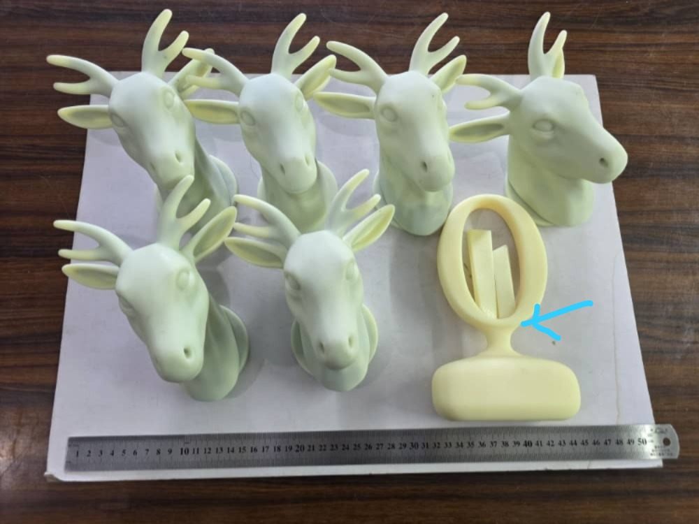 3D printed deer head sculptures surface-prepared and refined, ready for chrome finishing